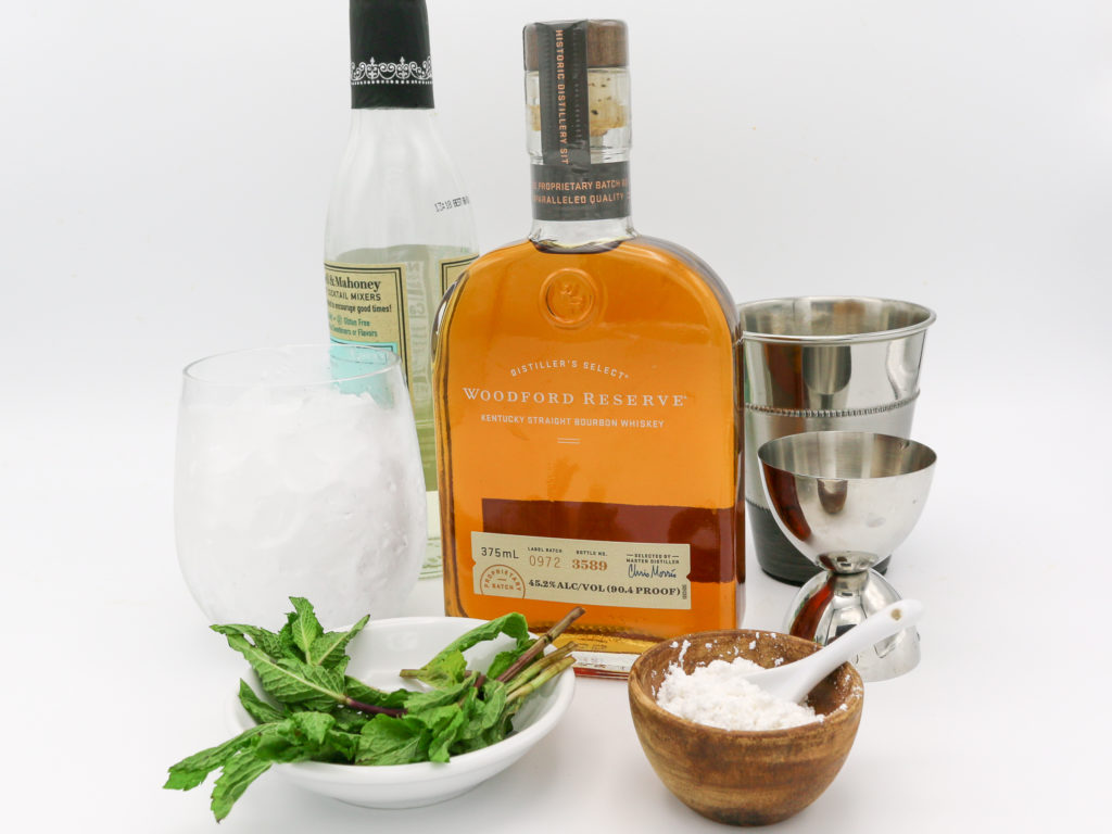 Easy mint julep ingredients on a white background
